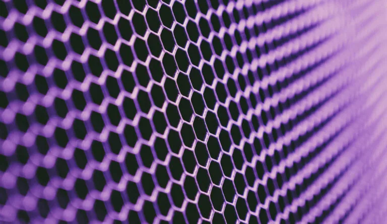 Purple hexagonal mesh pattern with three-dimensional perspective